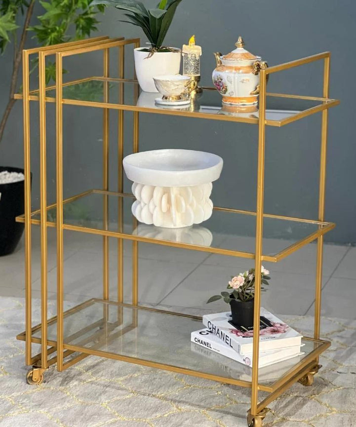 تروللي شاي ذهبي بعجل